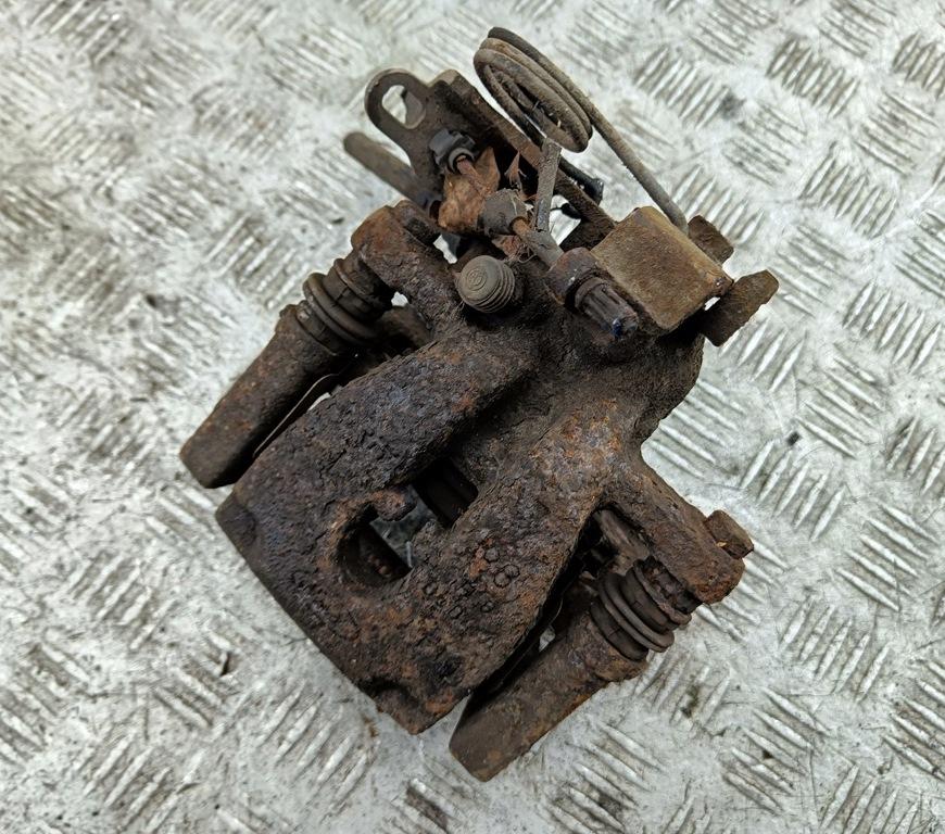 Суппорт задний левый