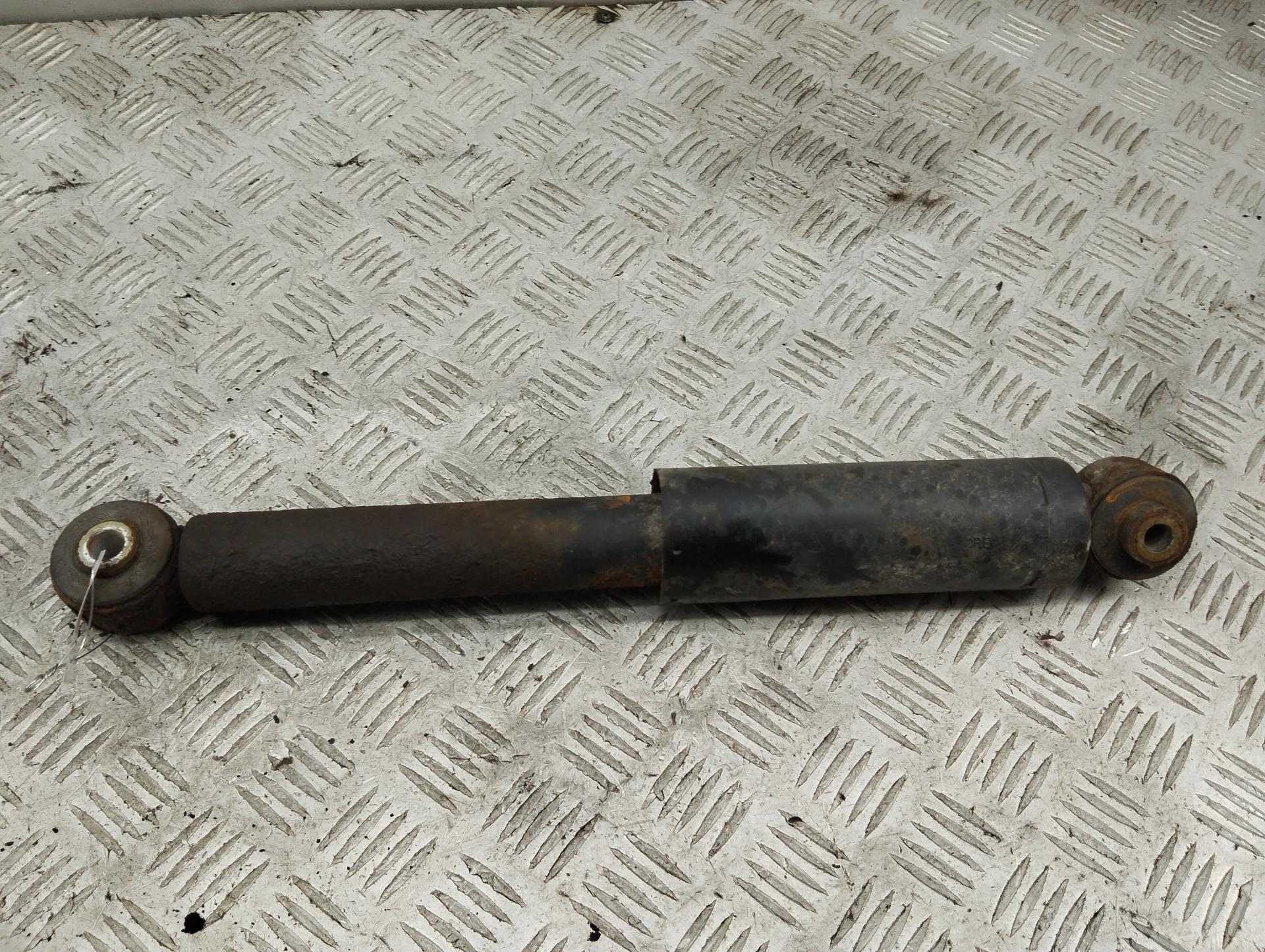 Амортизатор подвески задний левый