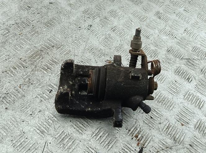 Суппорт задний левый