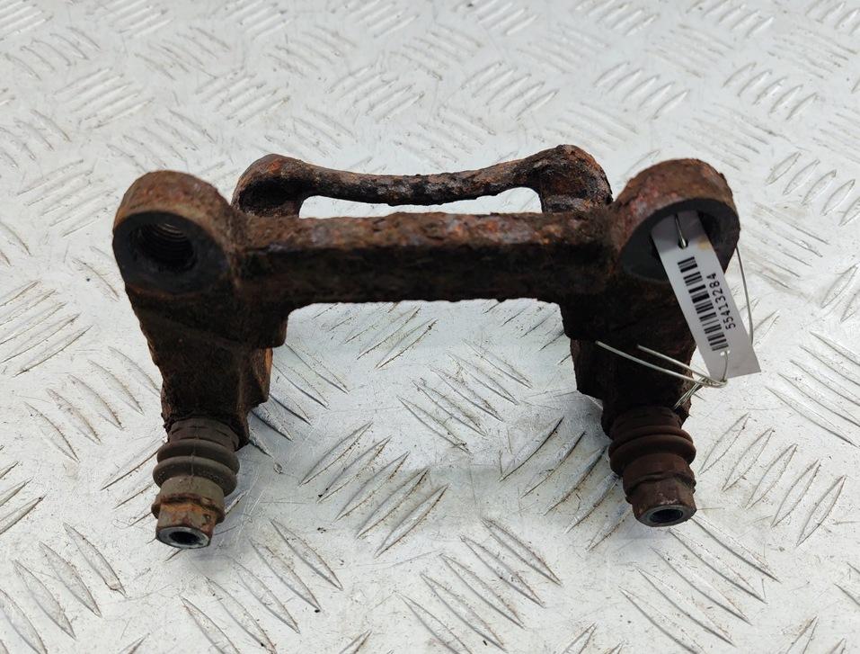 Скоба суппорта заднего