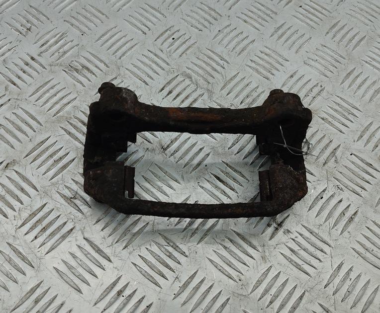 Скоба суппорта заднего