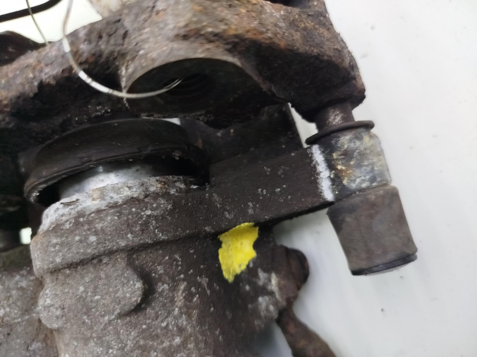 Суппорт задний левый
